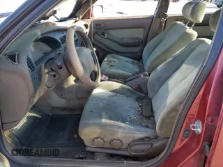 1993 Toyota Camry LE with VIN JT2SK12E8P0149731, listed as a Copart auction lot 83082154 with 197,590 mi miles and Salvage Title. Bid and sale history available at carsss.com. Image 7.