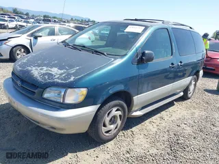 1998 Toyota Sienna LE with VIN 4T3ZF13CXWU023663, listed as a IAAI auction lot 42011727 with 214,972 mi miles. Bid and sale history available at carsss.com. Image 2.
