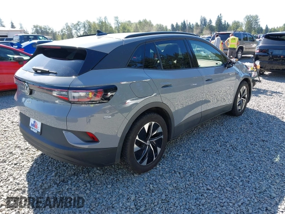 2021 Volkswagen ID.4 Pro S z VIN WVGTMPE20MP058882, wystawiony jako IAAI lot #42317440 z przebiegiem 64 473 mil mil oraz . Historia ofert i sprzedaży dostępna na DreamBid. Obrazek 4.
