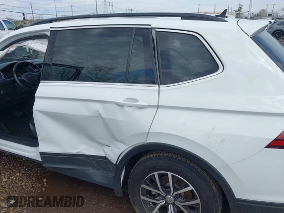 2019 Volkswagen Tiguan SE with VIN 3VV2B7AX7KM125053, listed as a IAAI auction lot 41892539 with 78,865 mi miles and . Bid and sale history available at DreamBid. Image 6.