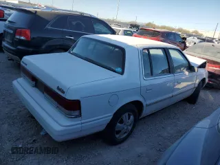 1993 Plymouth Acclaim z VIN 3P3XA46K9PT641785, wystawiony jako Copart lot #82825254 z przebiegiem 107 752 mil mil oraz Nie do naprawy. Historia ofert i sprzedaży dostępna na DreamBid. Obrazek 3.