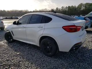 2019 BMW X6 xDrive35i with VIN 5UXKU2C5XK0Z65384, listed as a Copart auction lot 46660415 with 89,984 mi miles and Salvage Title. Bid and sale history available at carsss.com. Image 2.