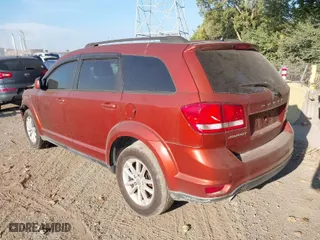 2013 Dodge Journey SXT with VIN 3C4PDCBG7DT517089, listed as a IAAI auction lot 40225020 with 210,944 mi miles. Bid and sale history available at carsss.com. Image 3.