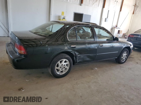 1999 Nissan Maxima GXE z VIN JN1CA21D0XT808755, wystawiony jako Copart lot #49693685 z przebiegiem 63 389 mil mil oraz Szkoda całkowita • Salvage title. Historia ofert i sprzedaży dostępna na DreamBid. Obrazek 3.
