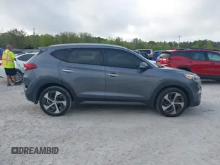 2016 Hyundai Tucson Limited with VIN KM8J33A27GU245096, listed as a IAAI auction lot 41961905 with 101,195 mi miles. Bid and sale history available at carsss.com. Image 13.