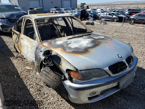 2002 BMW 3 Series 330i with VIN WBAEV53472KM22788, listed as a Copart auction lot 42279083 with 0 mi miles and Salvage Title. Bid and sale history available at carsss.com. Image 4.