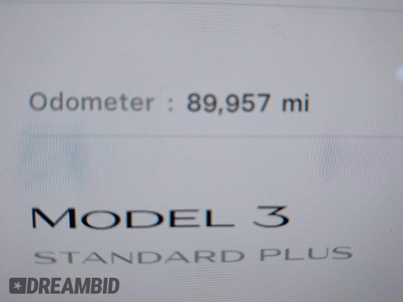 2020 Tesla Model 3 Standard Range Plus with VIN 5YJ3E1EA0LF597761, listed as a IAAI auction lot 41773918 with 89,957 mi miles. Bid and sale history available at carsss.com. Image 14.