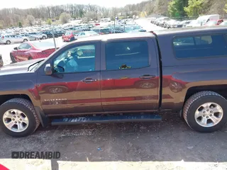 2016 Chevrolet Silverado 1500 LT with VIN 3GCUKREC3GG305792, listed as a IAAI auction lot 42083847 with 72,325 mi miles and . Bid and sale history available at DreamBid. Image 15.