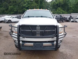 2006 Dodge 2500 SLT z VIN 3D7KS28C36G230672, wystawiony jako IAAI lot #42396365 z przebiegiem 190 519 mil mil oraz . Historia ofert i sprzedaży dostępna na DreamBid. Obrazek 13.