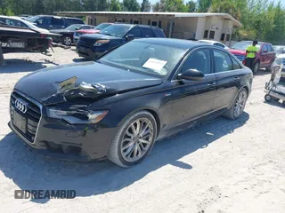2013 Audi A6 3.0T Premium Plus with VIN WAUGGAFC5DN008487, listed as a IAAI auction lot 42043992 with 168,849 mi miles. Bid and sale history available at carsss.com. Image 2.