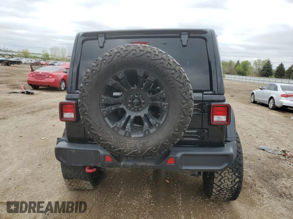 2021 Jeep Wrangler Unlimited Rubicon z VIN 1C4HJXFN1MW793064, wystawiony jako Copart lot #55643305 z przebiegiem 51 944 mil mil oraz Szkoda całkowita • Salvage title. Historia ofert i sprzedaży dostępna na DreamBid. Obrazek 6.