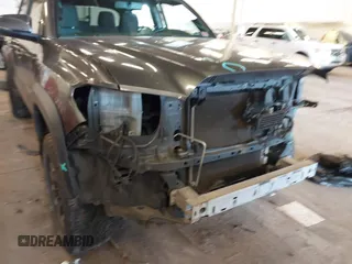 2016 Toyota Tacoma SR with VIN 3TMCZ5AN2GM041649, listed as a IAAI auction lot 41758859 with 139,558 mi miles and . Bid and sale history available at DreamBid. Image 18.