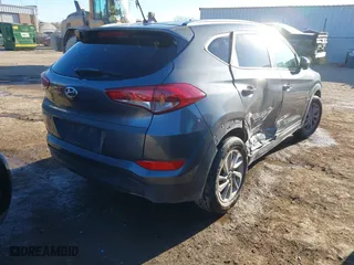 2016 Hyundai Tucson SE with VIN KM8J33A45GU089996, listed as a IAAI auction lot 41687069 with 129,957 mi miles. Bid and sale history available at carsss.com. Image 4.