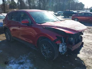 2017 Mazda CX-5 Touring with VIN JM3KFBCL1H0227290, listed as a IAAI auction lot 41400188 with 58,801 mi miles. Bid and sale history available at carsss.com. Image 1.