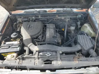 1994 Nissan Frontier XE z VIN 1N6SD16S1RC372743, wystawiony jako Copart lot #54486495 z przebiegiem 206 951 mil mil oraz Szkoda całkowita • Salvage title. Historia ofert i sprzedaży dostępna na DreamBid. Obrazek 11.