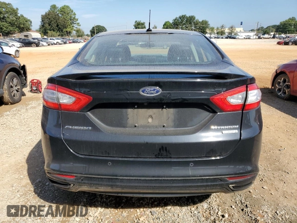 2016 Ford Fusion Titanium z VIN 3FA6P0K98GR151640, wystawiony jako Copart lot #73254594 z przebiegiem 145 473 mil mil oraz Szkoda całkowita • Salvage title. Historia ofert i sprzedaży dostępna na DreamBid. Obrazek 6.