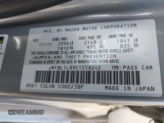 2012 Mazda Mazda3 i Touring with VIN JM1BL1L89C1558242, listed as a IAAI auction lot 42057513 with 112,094 mi miles. Bid and sale history available at carsss.com. Image 9.