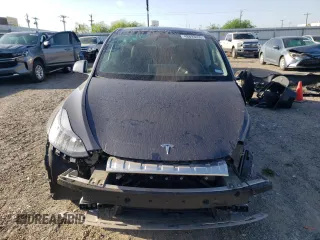2023 Tesla Model Y z VIN 7SAYGDED8PF958836, wystawiony jako Copart lot #48893455 z przebiegiem 19 040 mil mil oraz Szkoda całkowita • Salvage title. Historia ofert i sprzedaży dostępna na DreamBid. Obrazek 5.