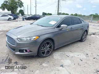 2013 Ford Fusion Titanium with VIN 3FA6P0K96DR131317, listed as a IAAI auction lot 42552736 with 154,762 mi miles and . Bid and sale history available at DreamBid. Image 2.