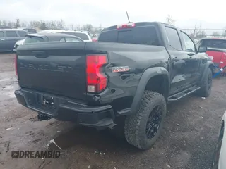 2023 Chevrolet Colorado 4WD Trail Boss with VIN 1GCPTEEK9P1196702, listed as a IAAI auction lot 41924581 with 21,882 mi miles. Bid and sale history available at carsss.com. Image 4.