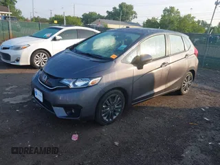 2015 Honda Fit EX with VIN 3HGGK5G86FM755209, listed as a IAAI auction lot 42450499 with 29,735 mi miles and . Bid and sale history available at DreamBid. Image 2.