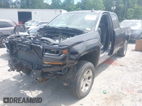 2016 Chevrolet Silverado 1500 LT with VIN 1GCVKREC4GZ326414, listed as a IAAI auction lot 42225681 with Not Provided miles and . Bid and sale history available at DreamBid. Image 2.