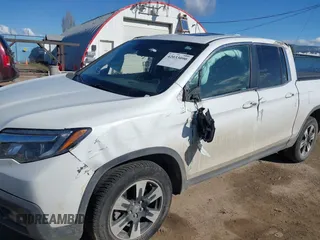 2020 Honda Ridgeline RTL with VIN 5FPYK3F50LB028430, listed as a IAAI auction lot 42033090 with Not provided miles and . Bid and sale history available at DreamBid. Image 6.