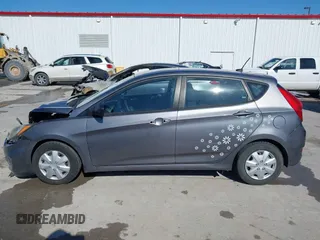 2014 Hyundai Accent GS with VIN KMHCT5AE9EU151393, listed as a IAAI auction lot 41571254 with 163,092 mi miles. Bid and sale history available at carsss.com. Image 15.