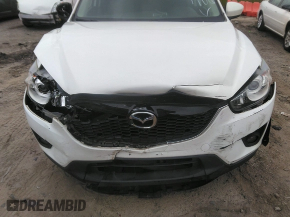 2014 Mazda CX-5 Touring z VIN JM3KE4CY0E0303748, wystawiony jako IAAI lot #42127406 z przebiegiem Nie podano mil oraz . Historia ofert i sprzedaży dostępna na DreamBid. Obrazek 6.