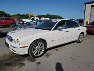 2005 Jaguar XJ Vanden Plas with VIN SAJWA82C35SG39616, listed as a Copart auction lot 61120295 with 179,174 mi miles and Salvage title. Bid and sale history available at DreamBid. Image 1.