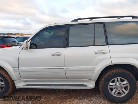 2000 Lexus LX 470 z VIN JT6HT00W9Y0103225, wystawiony jako IAAI lot #41148826 z przebiegiem 270 351 mil mil oraz . Historia ofert i sprzedaży dostępna na DreamBid. Obrazek 14.