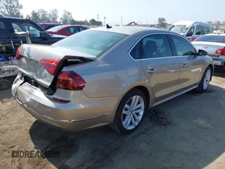 2017 Volkswagen Passat SE with VIN 1VWGT7A36HC084422, listed as a IAAI auction lot 42650872 with 135,203 mi miles and . Bid and sale history available at DreamBid. Image 4.