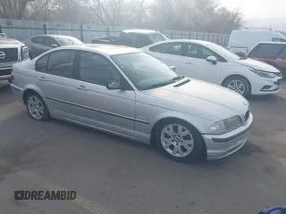 1999 BMW 3 Series 323i with VIN WBAAM3331XCD55039, listed as a IAAI auction lot 41884968 with 187,106 mi miles. Bid and sale history available at carsss.com. Image 1.