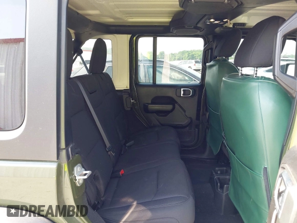 2023 Jeep Wrangler Willys with VIN 1C4HJXDG7PW646627, listed as a IAAI auction lot 42469601 with 50,178 mi miles and . Bid and sale history available at DreamBid. Image 8.