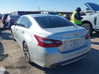 2018 Nissan Altima 2.5 S with VIN 1N4AL3AP0JC140855, listed as a IAAI auction lot 41633820 with 102,716 mi miles. Bid and sale history available at carsss.com. Image 3.