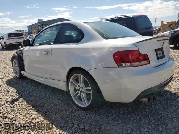2012 BMW 1 Series 135i with VIN WBAUC9C52CVM12915, listed as a Copart auction lot 67145834 with 114,306 mi miles and Salvage title. Bid and sale history available at DreamBid. Image 2.