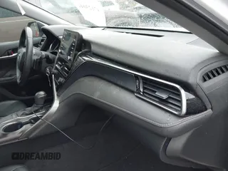 2023 Toyota Camry SE z VIN 4T1G11AK4PU738724, wystawiony jako IAAI lot #42123044 z przebiegiem 58 659 mil mil oraz . Historia ofert i sprzedaży dostępna na DreamBid. Obrazek 17.