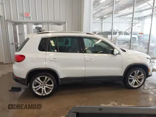 2016 Volkswagen Tiguan S with VIN WVGBV7AX0GW532236, listed as a IAAI auction lot 41610575 with 104,193 mi miles and . Bid and sale history available at DreamBid. Image 12.