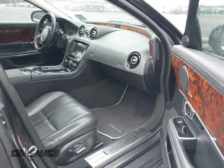2014 Jaguar XJ with VIN SAJWA1CZ0E8V73966, listed as a IAAI auction lot 41887234 with 120,804 mi miles and . Bid and sale history available at DreamBid. Image 5.