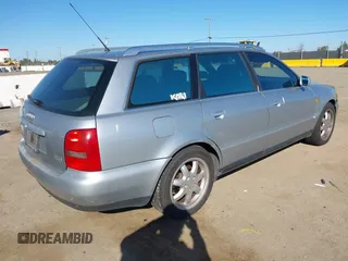1998 Audi A4 with VIN WAUGD28D5WA235015, listed as a IAAI auction lot 41744703 with 233,432 mi miles. Bid and sale history available at carsss.com. Image 4.