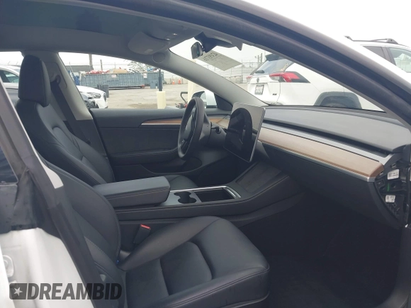 2023 Tesla Model 3 с VIN 5YJ3E1EA5PF496902, выставлен на аукционе IAAI как лот 42493716 с пробегом Не указан миль и . История ставок и продаж доступна на DreamBid. Изображение 5.