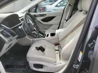 2020 Jaguar I-Pace SE z VIN SADHC2S10L1F83543, wystawiony jako Copart lot #78755163 z przebiegiem 18 792 mil mil oraz . Historia ofert i sprzedaży dostępna na DreamBid. Obrazek 7.