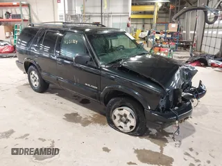 2002 Chevrolet Blazer LS z VIN 1GNDT13W72K232625, wystawiony jako IAAI lot #41551854 z przebiegiem 123 498 mil mil oraz . Historia ofert i sprzedaży dostępna na DreamBid. Obrazek 1.