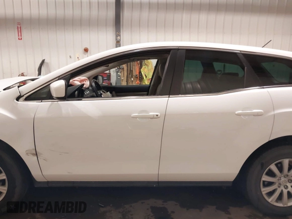 2012 Mazda CX-7 i Touring z VIN JM3ER2C51C0411837, wystawiony jako IAAI lot #42023100 z przebiegiem 85 112 mil mil oraz . Historia ofert i sprzedaży dostępna na DreamBid. Obrazek 15.