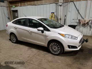 2016 Ford Fiesta Titanium z VIN 3FADP4CJ0GM167738, wystawiony jako Copart lot #57875245 z przebiegiem 159 230 mil mil oraz Czysty tytuł • Clean title. Historia ofert i sprzedaży dostępna na DreamBid. Obrazek 4.