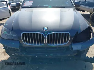 2012 BMW X5 35d with VIN 5UXZW0C51CL669957, listed as a IAAI auction lot 42230292 with 102,305 mi miles and . Bid and sale history available at DreamBid. Image 12.