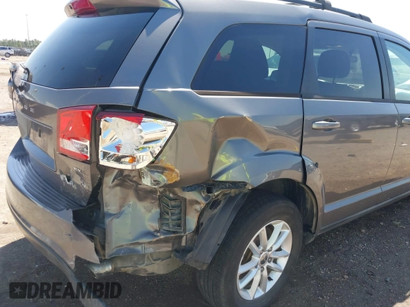 2013 Dodge Journey SXT with VIN 3C4PDDBGXDT650886, listed as a IAAI auction lot 41864331 with 224,579 mi miles and . Bid and sale history available at DreamBid. Image 6.