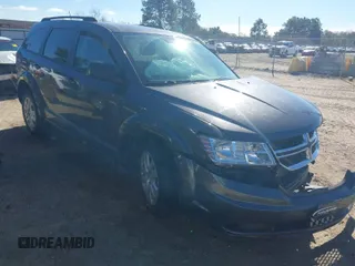2018 Dodge Journey SE with VIN 3C4PDCAB9JT241502, listed as a IAAI auction lot 41253101 with 100,858 mi miles. Bid and sale history available at carsss.com. Image 1.