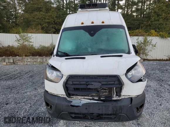 2020 Ford Transit Cargo with VIN 1FTBF4XG3LKB70573, listed as a Copart auction lot 77039474 with 131,873 mi miles and Salvage Title. Bid and sale history available at DreamBid. Image 5.
