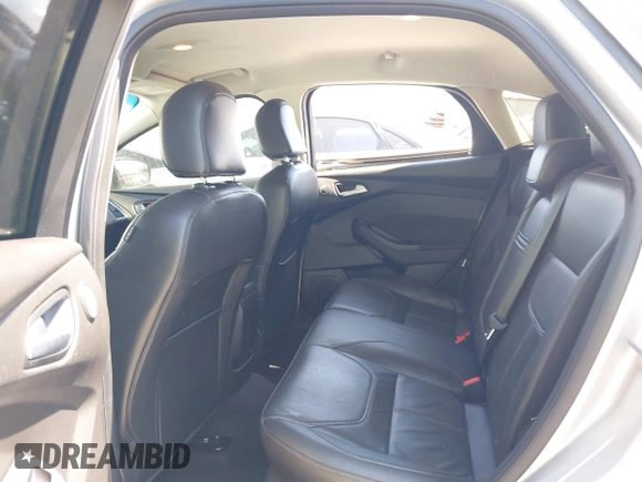 2015 Ford Focus Titanium with VIN 1FADP3N23FL356822, listed as a IAAI auction lot 41981053 with 115,584 mi miles and . Bid and sale history available at DreamBid. Image 8.